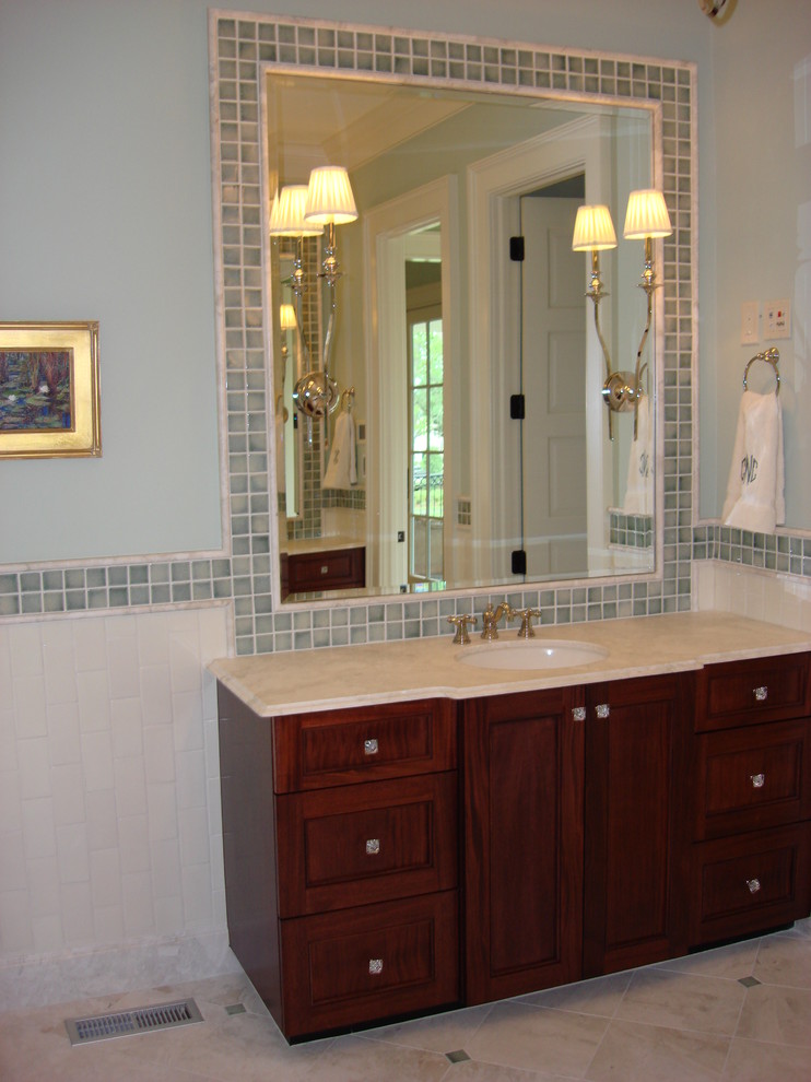 Example of a large transitional master beige floor and double-sink alcove bathtub design in Charleston with an undermount sink, multicolored countertops and a built-in vanity