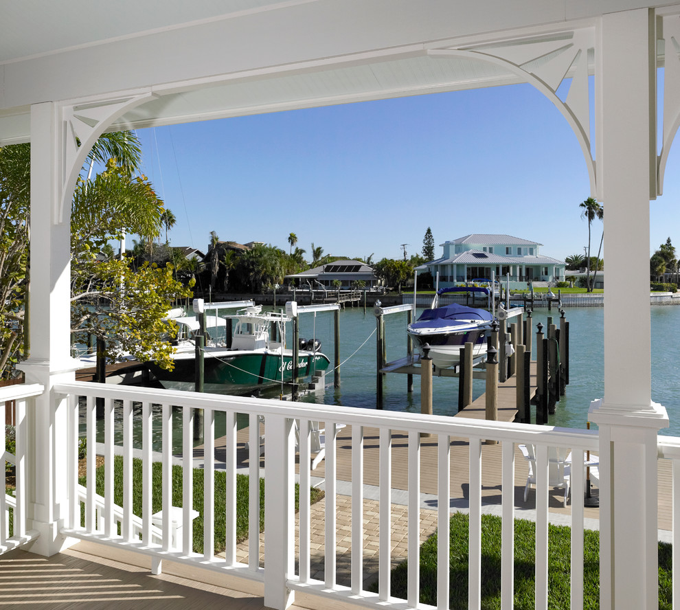 This is an example of a beach style deck in Tampa.