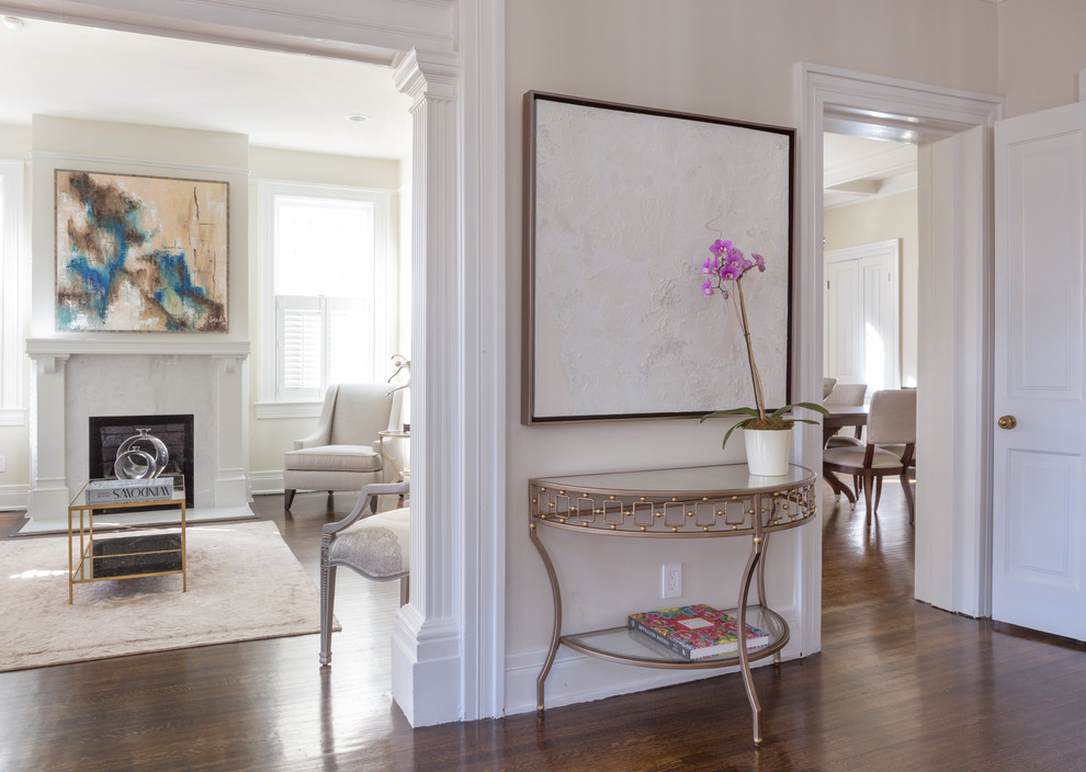 Design ideas for an expansive transitional hallway in New Orleans with beige walls and medium hardwood floors.