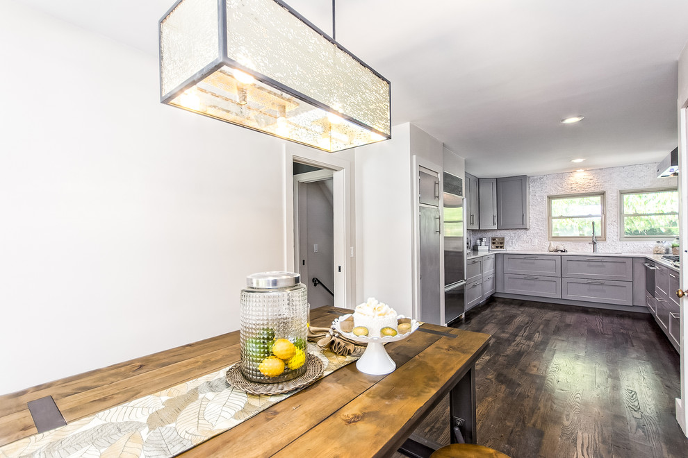 Mid-sized transitional home design photo in Columbus