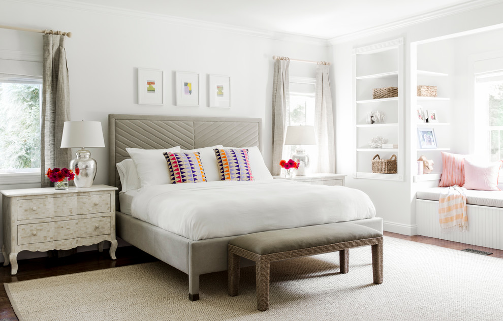 Design ideas for a transitional bedroom in New York with white walls and dark hardwood floors.