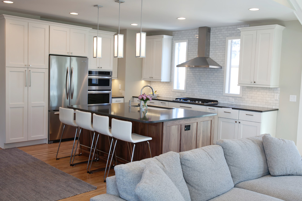Example of a transitional kitchen design in Denver