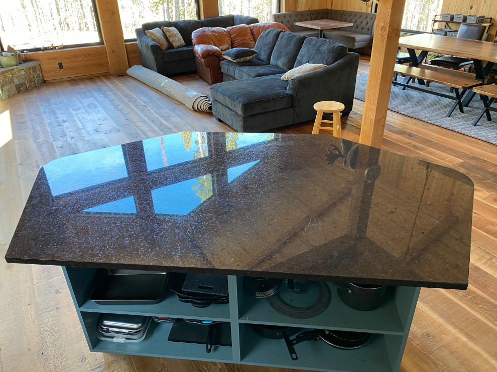 Example of a mountain style home design design in Denver