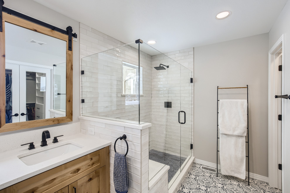 Design ideas for a large modern bathroom in Denver with shaker cabinets, medium wood cabinets, white tile, quartzite benchtops, white benchtops, a double vanity and a built-in vanity.