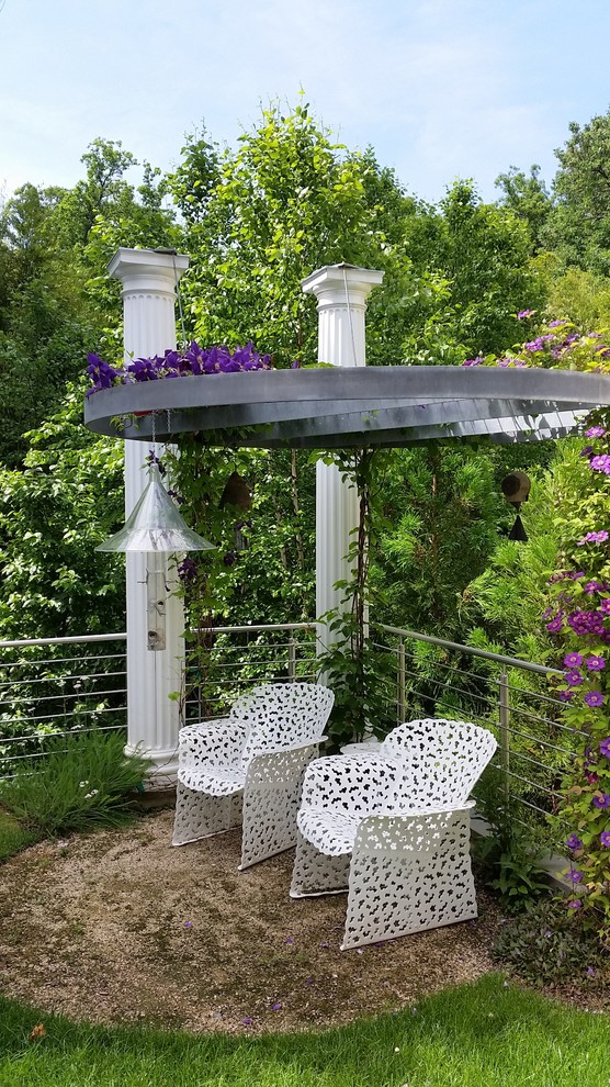 Inspiration for a transitional patio in DC Metro with a pergola.