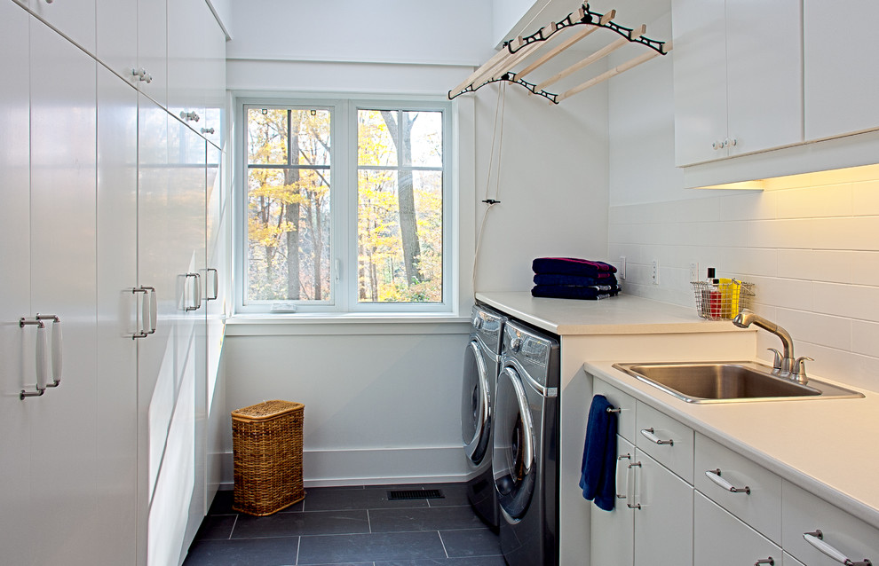 Inspiration for a traditional laundry room in Toronto with white benchtop.
