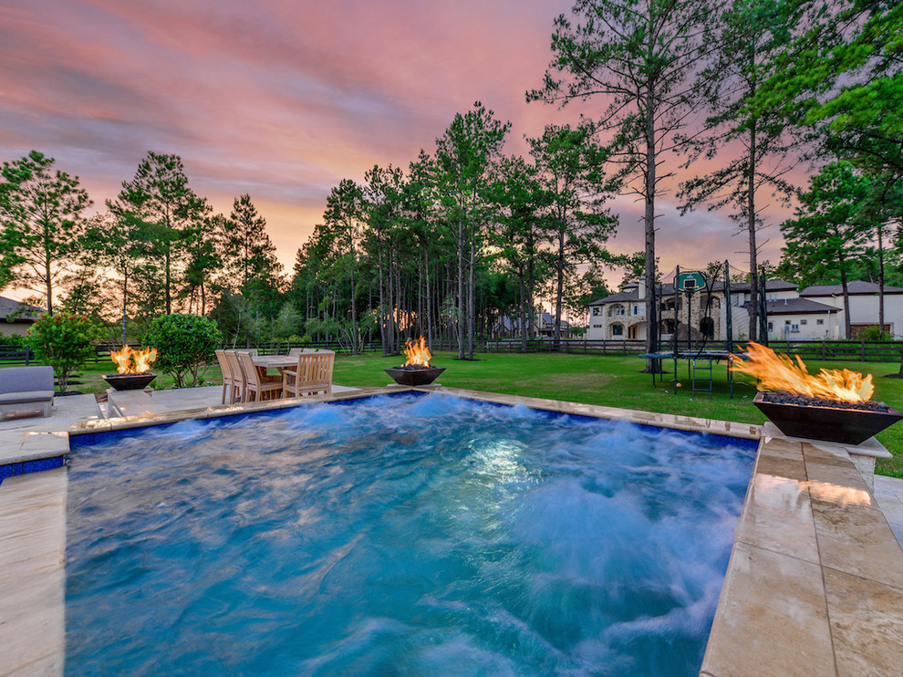 Hot tub - large transitional backyard stone and rectangular natural hot tub idea in Houston
