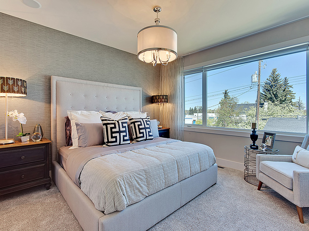 Photo of a mid-sized transitional master bedroom in Calgary with beige walls, carpet and no fireplace.
