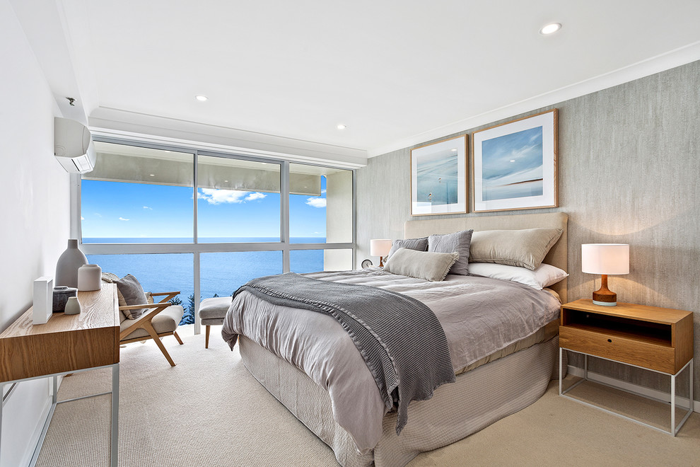 Design ideas for a contemporary master bedroom in Gold Coast - Tweed with grey walls, carpet and beige floor.