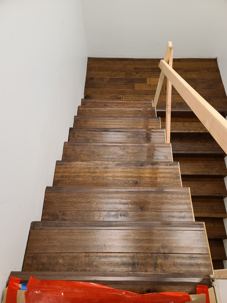 Sleek Engineered Hardwood & Modern Sliding Door by I’m The Man Services