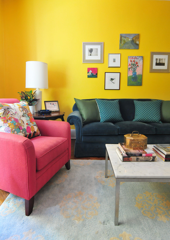 Eclectic living room in DC Metro with yellow walls.