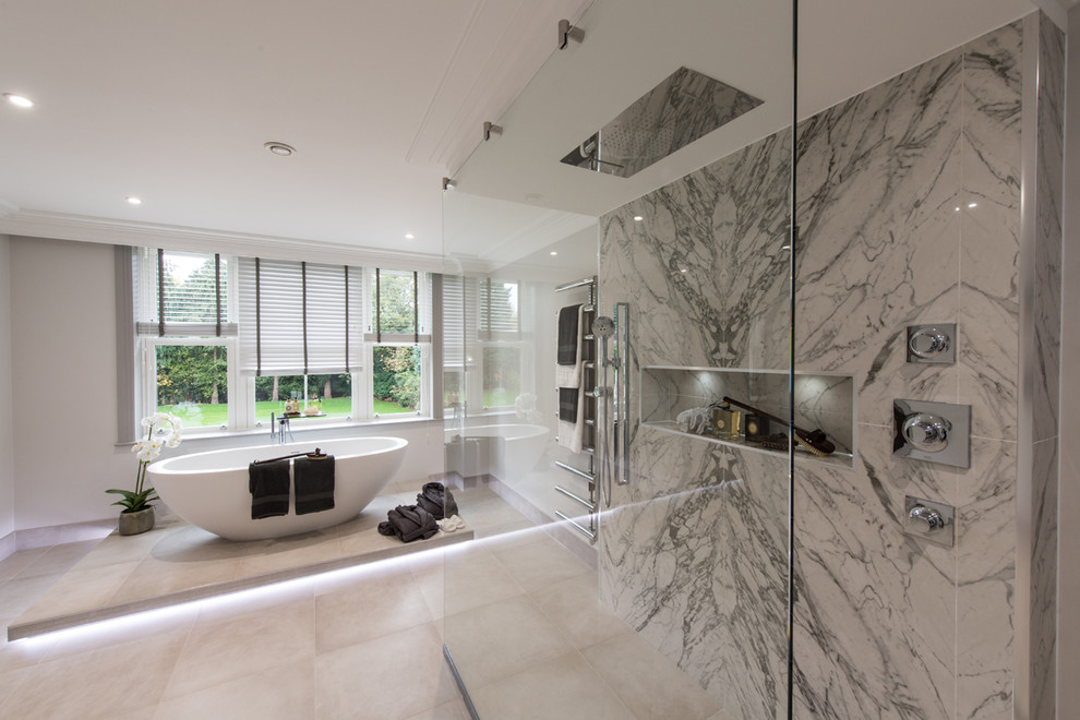 Expansive contemporary bathroom in London with a freestanding tub, an open shower, porcelain tile, porcelain floors and grey floor.