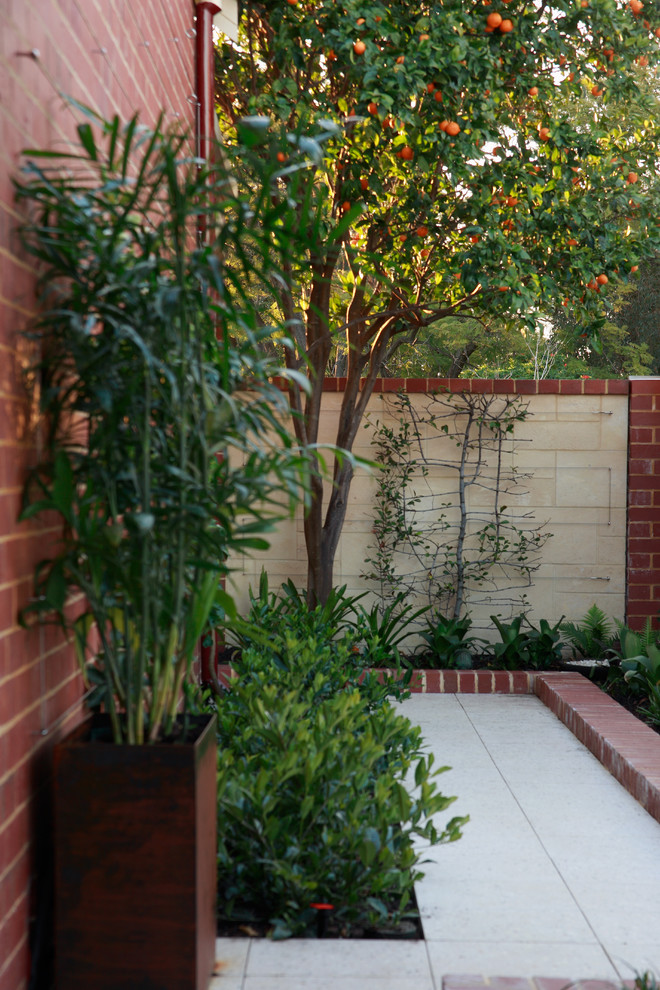 This is an example of a mid-sized contemporary patio in Perth.