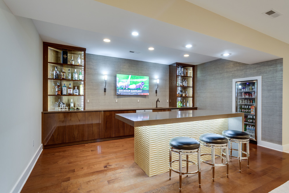 Inspiration for a transitional single-wall wet bar in DC Metro with an undermount sink, flat-panel cabinets, dark wood cabinets, quartz benchtops, brown splashback, dark hardwood floors, brown floor and brown benchtop.
