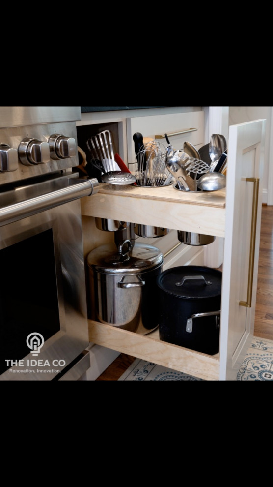 Inspiration for a mid-sized transitional galley light wood floor and brown floor kitchen pantry remodel with a single-bowl sink, recessed-panel cabinets, white cabinets, quartzite countertops, multicolored backsplash, ceramic backsplash, stainless steel appliances, an island and white countertops
