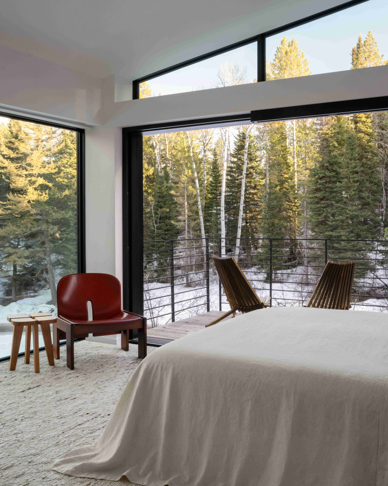 Example of a minimalist bedroom design in Los Angeles