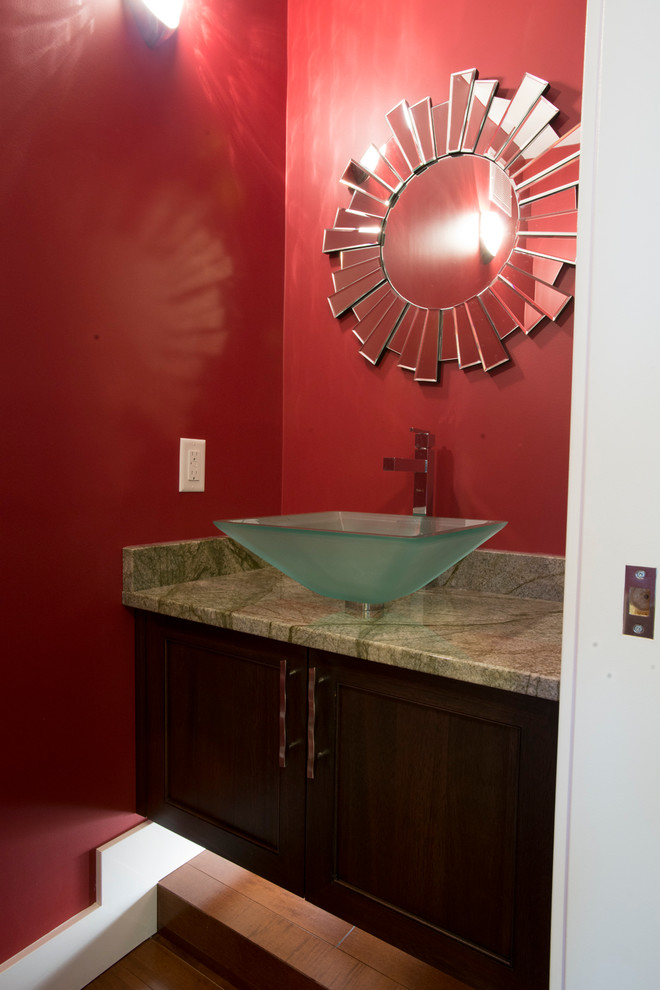 Example of a transitional home design design in Vancouver