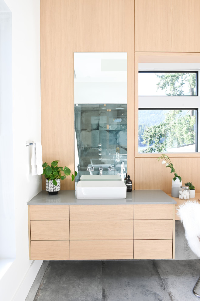 Contemporary master bathroom in Vancouver with light wood cabinets, white walls, a vessel sink, quartzite benchtops, grey benchtops, flat-panel cabinets, concrete floors, green floor, a single vanity, a floating vanity and wood walls.