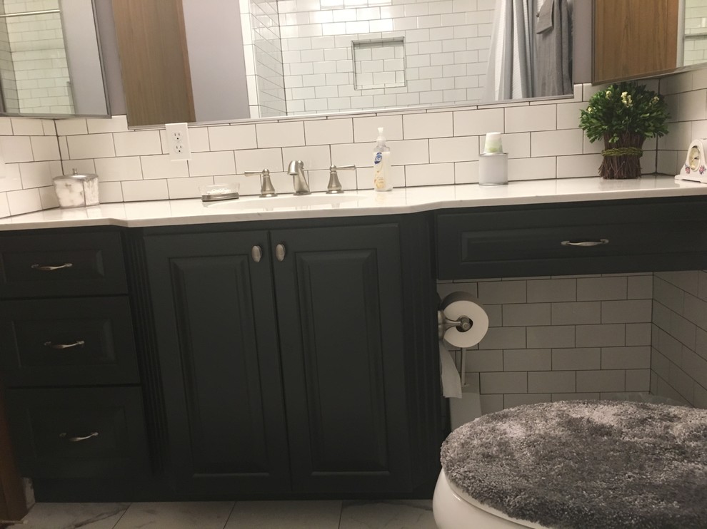 Design ideas for a small transitional master bathroom in Chicago with raised-panel cabinets, grey cabinets, an alcove tub, an alcove shower, a two-piece toilet, white tile, ceramic tile, purple walls, porcelain floors, an integrated sink, onyx benchtops, white floor and a shower curtain.