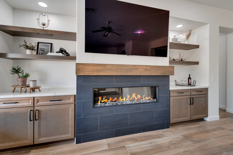 Inspiration for a mid-sized transitional u-shaped ceramic tile and brown floor eat-in kitchen remodel in Phoenix with beaded inset cabinets, brown cabinets, quartzite countertops, white backsplash, ceramic backsplash, an island and white countertops