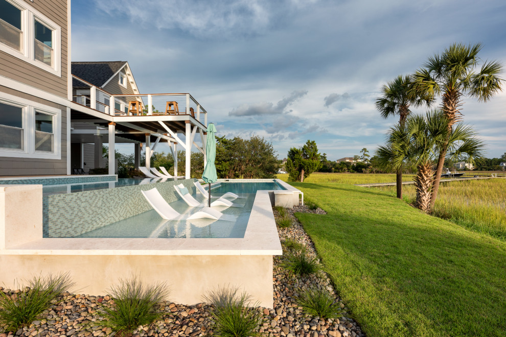 Inspiration for a modern pool remodel in Charleston