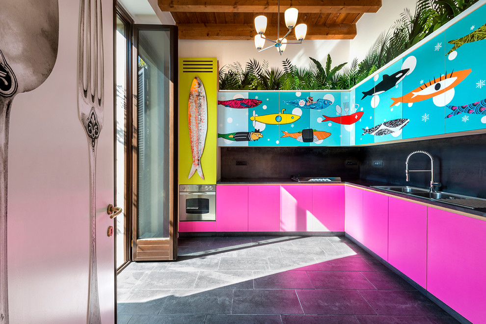 Photo of a mid-sized eclectic l-shaped kitchen in Milan.