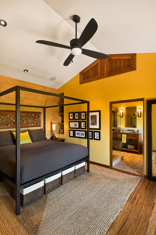 This is an example of a contemporary bedroom in Santa Barbara with yellow walls.