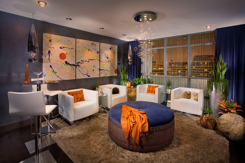 Inspiration for a contemporary family room in Orange County with grey walls.