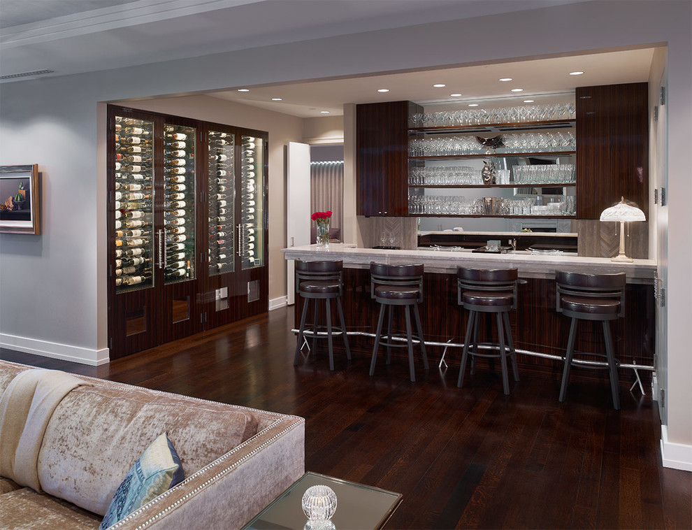 Design ideas for a large contemporary galley seated home bar in Philadelphia with dark wood cabinets, grey splashback, dark hardwood floors and open cabinets.