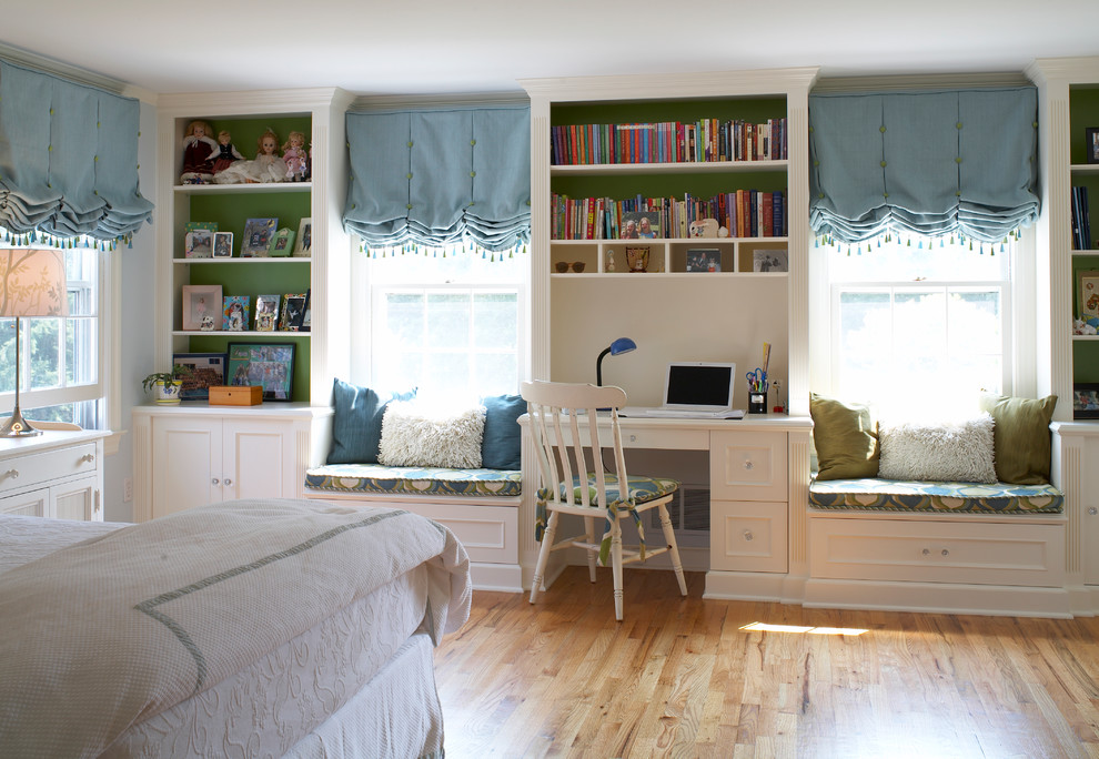 This is an example of a traditional kids' room in Boston with multi-coloured walls.