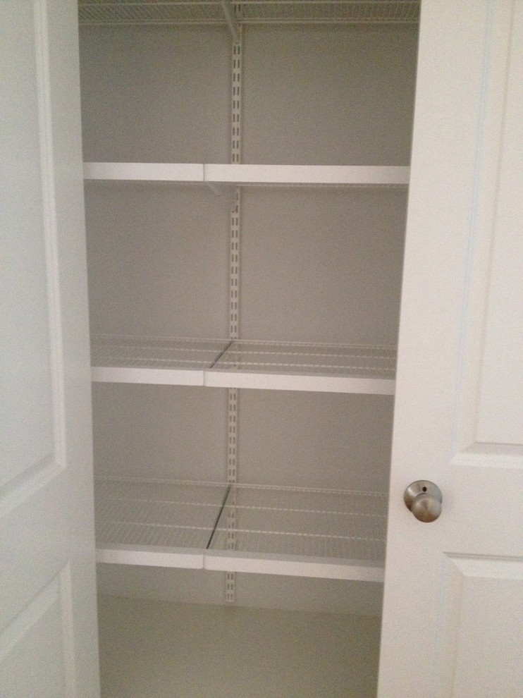 Example of a transitional closet design in Boston