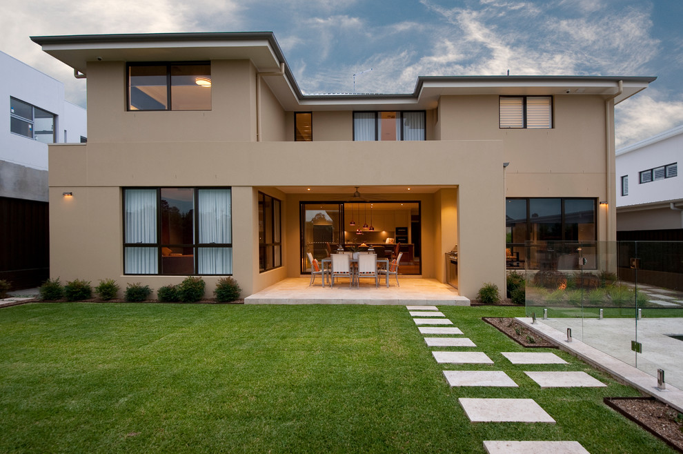 Photo of a contemporary two-storey brown house exterior in Sydney.