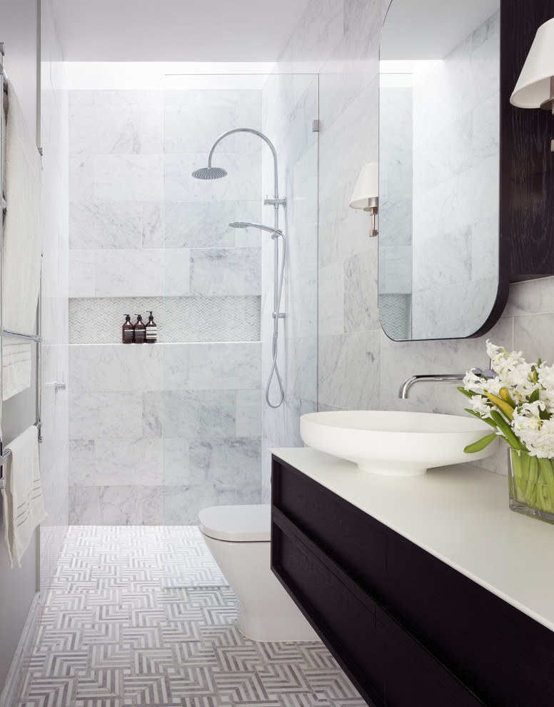 Inspiration for a small transitional master bathroom in Melbourne with furniture-like cabinets, dark wood cabinets, a curbless shower, a one-piece toilet, gray tile, marble, grey walls, marble floors, a vessel sink, engineered quartz benchtops, multi-coloured floor, an open shower and white benchtops.