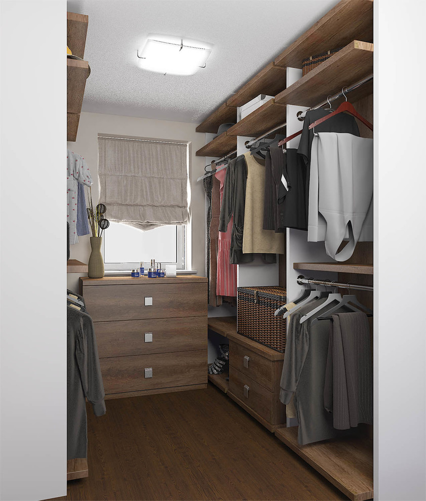 This is an example of a mid-sized contemporary gender-neutral walk-in wardrobe in London with flat-panel cabinets, brown cabinets, medium hardwood floors and brown floor.