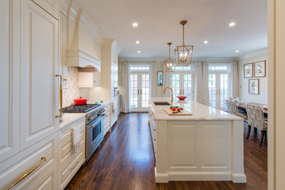 Photo of a large traditional single-wall eat-in kitchen in DC Metro with an undermount sink, beaded inset cabinets, white cabinets, quartzite benchtops, multi-coloured splashback, mosaic tile splashback, stainless steel appliances, medium hardwood floors, with island and brown floor.