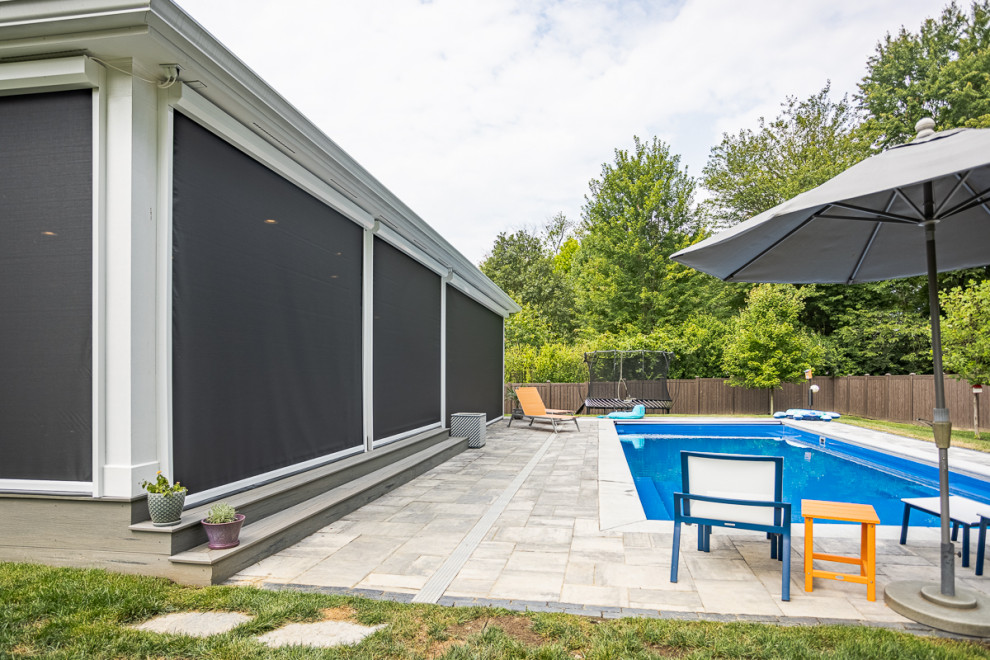 Inspiration for a large transitional backyard rectangular lap pool remodel in Cincinnati