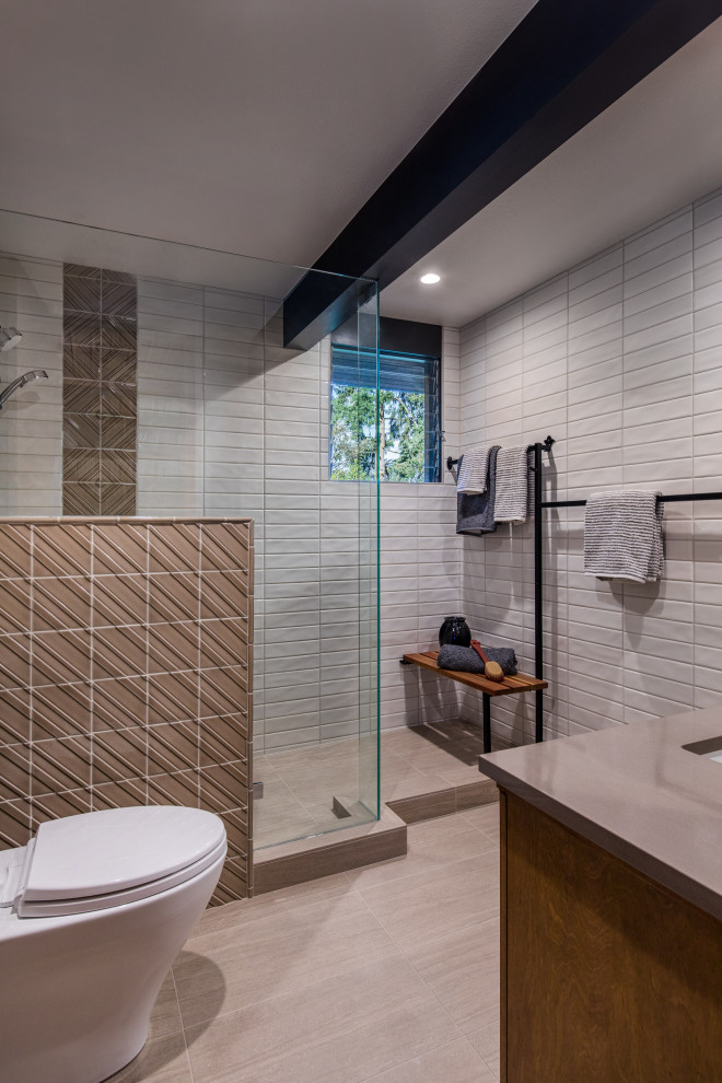 Mid-sized midcentury bathroom in Portland with an open shower, a one-piece toilet, white tile, ceramic tile, beige walls, porcelain floors, an undermount sink, engineered quartz benchtops, beige floor, an open shower, beige benchtops, a shower seat and a single vanity.