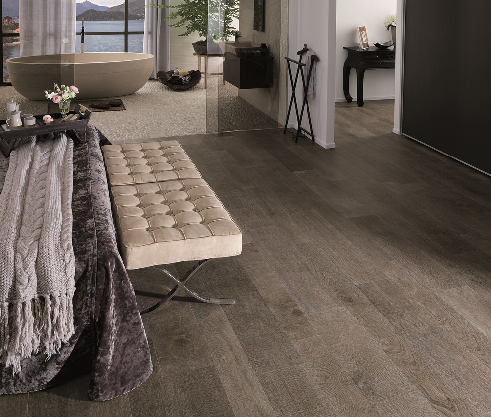 Inspiration for a contemporary bedroom in Perth with porcelain floors.