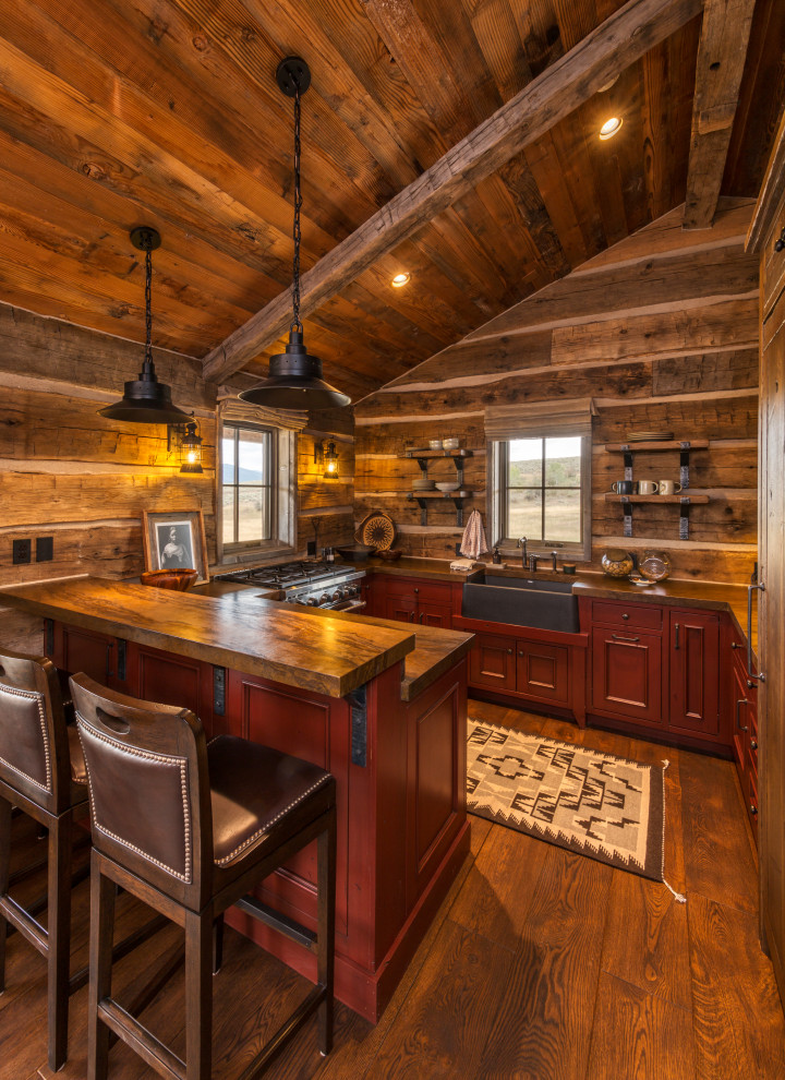 Mountain style home design photo in Denver