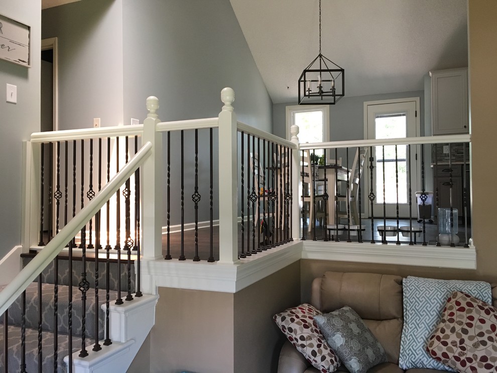 Inspiration for a large transitional u-shaped laminate floor and brown floor eat-in kitchen remodel in Tampa with an undermount sink, recessed-panel cabinets, gray cabinets, quartzite countertops, green backsplash, mosaic tile backsplash, black appliances, no island and white countertops