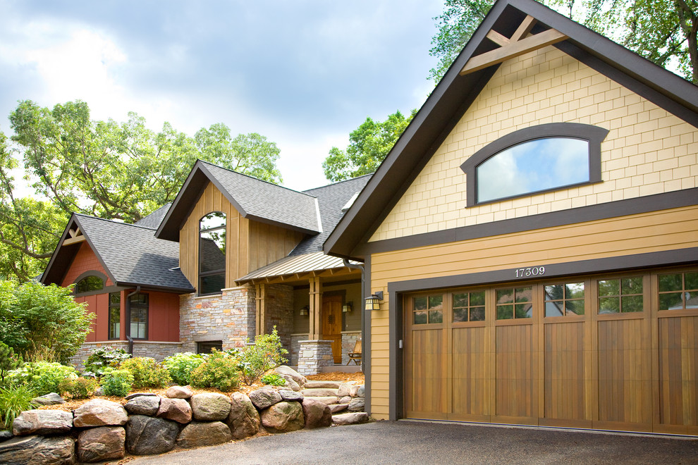 Inspiration for a traditional exterior in Minneapolis with mixed siding.