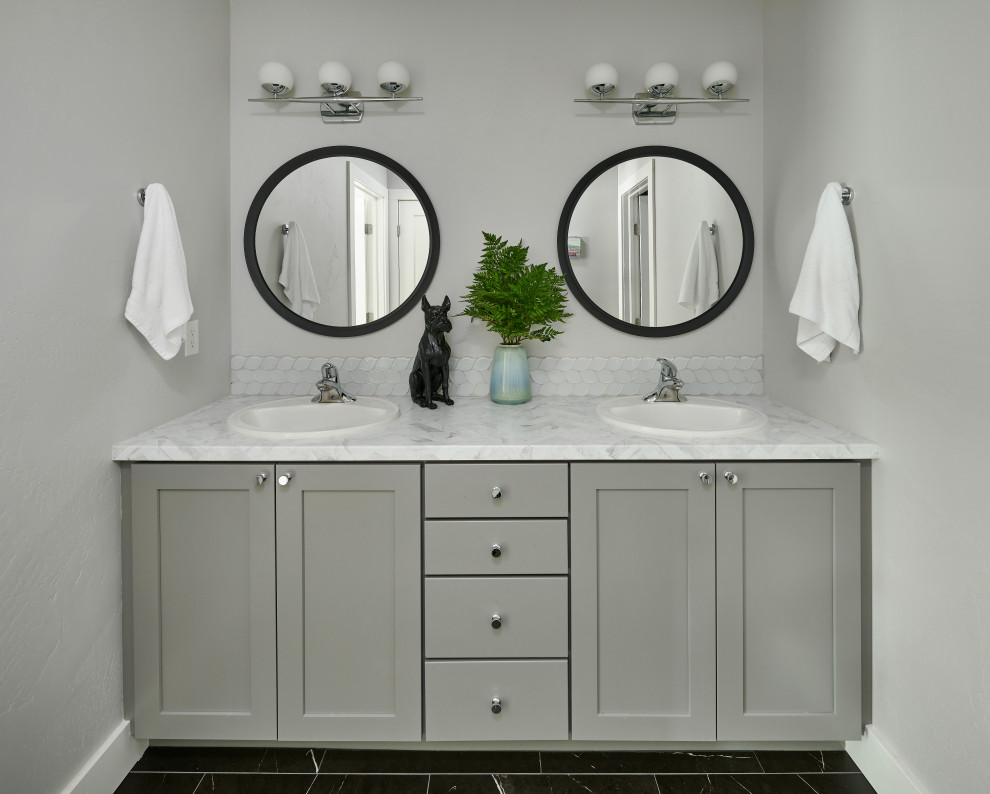 Mid-sized modern master bathroom in Denver with shaker cabinets, grey cabinets, a double shower, gray tile, glass tile, grey walls, porcelain floors, a drop-in sink, laminate benchtops, black floor, a hinged shower door, grey benchtops, a double vanity and a built-in vanity.