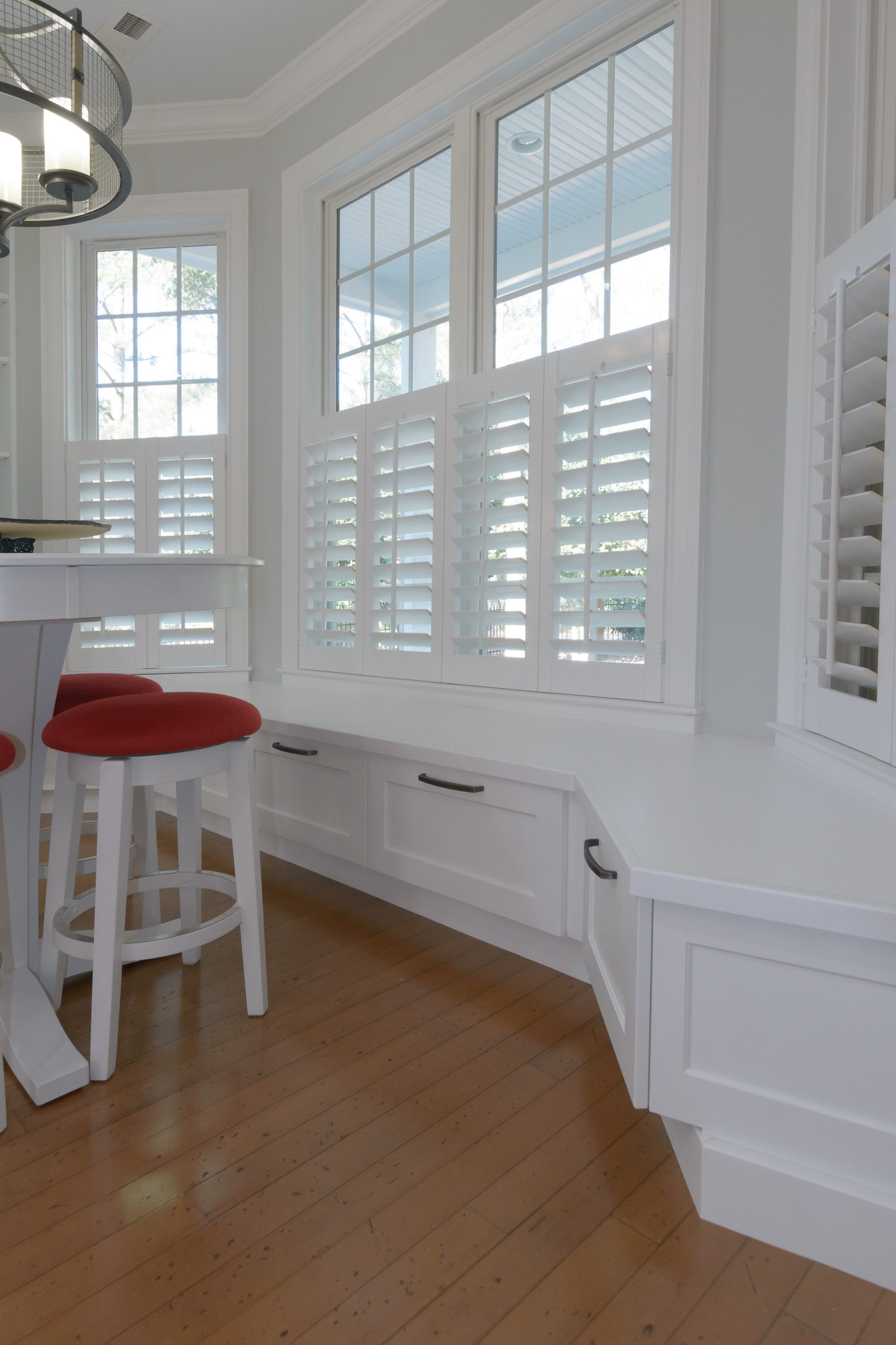 Pawley's Island modern white kitchen with butcher block island