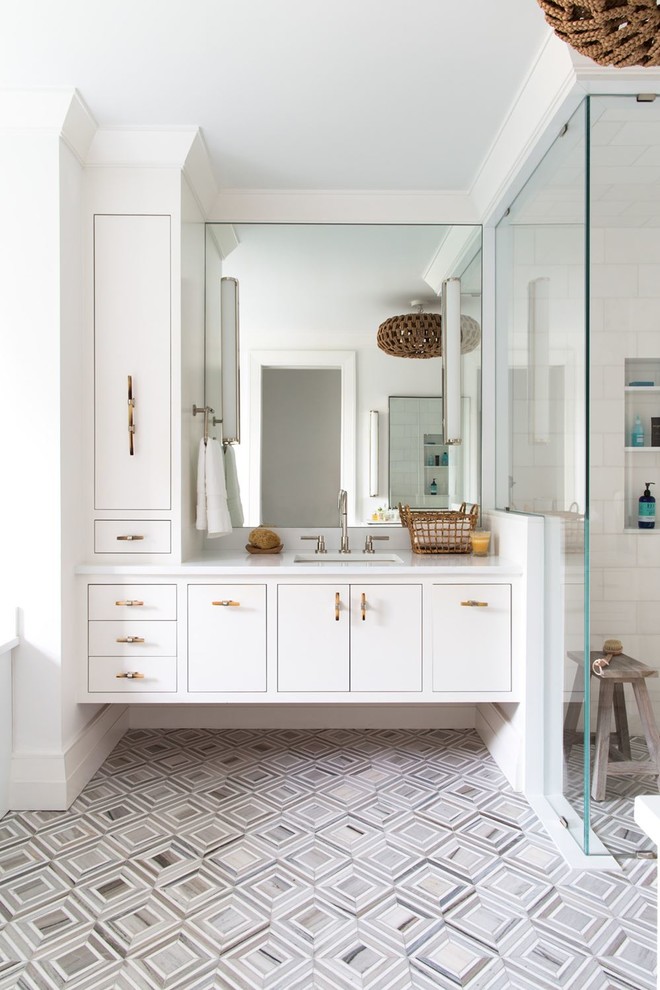Alcove bathtub - mid-sized transitional master white tile and ceramic tile alcove bathtub idea with flat-panel cabinets, white cabinets, marble countertops and white countertops