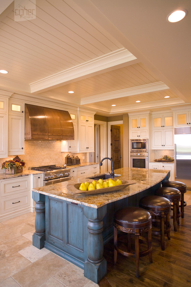 Large transitional u-shaped porcelain tile and multicolored floor eat-in kitchen photo with an undermount sink, recessed-panel cabinets, distressed cabinets, granite countertops, multicolored backsplash, porcelain backsplash, stainless steel appliances and an island