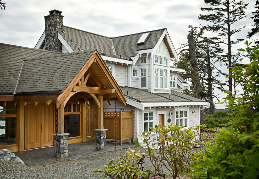 Design ideas for a beach style two-storey exterior in Vancouver.