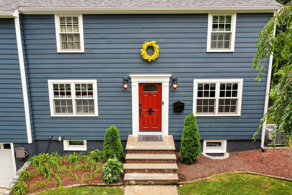 Design ideas for a large traditional three-storey blue house exterior in Boston with mixed siding, a gable roof, a shingle roof, a black roof and clapboard siding.