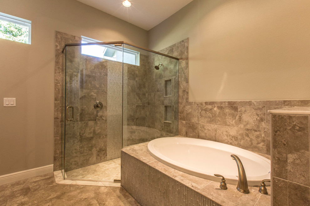 Design ideas for a mid-sized contemporary master bathroom in Tampa with an undermount sink, medium wood cabinets, engineered quartz benchtops, a drop-in tub, a curbless shower, gray tile, ceramic tile, grey walls and ceramic floors.