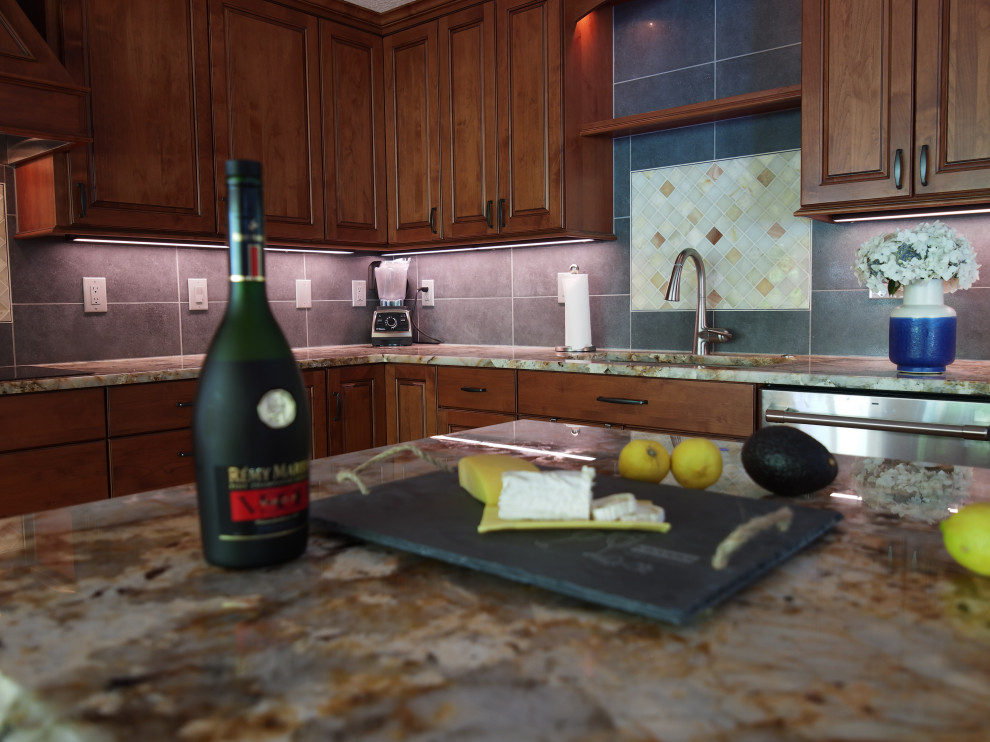 Mid-sized transitional l-shaped medium tone wood floor and yellow floor open concept kitchen photo with a single-bowl sink, raised-panel cabinets, medium tone wood cabinets, granite countertops, gray backsplash, porcelain backsplash, stainless steel appliances, an island and multicolored countertops