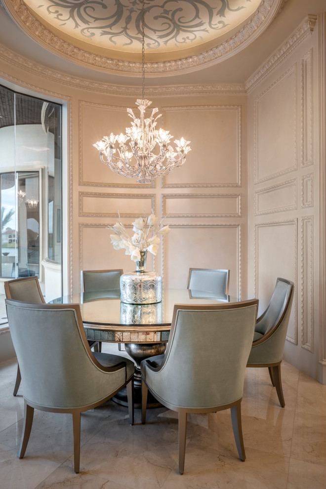 Large mediterranean dining room in Houston with beige walls, porcelain floors and beige floor.